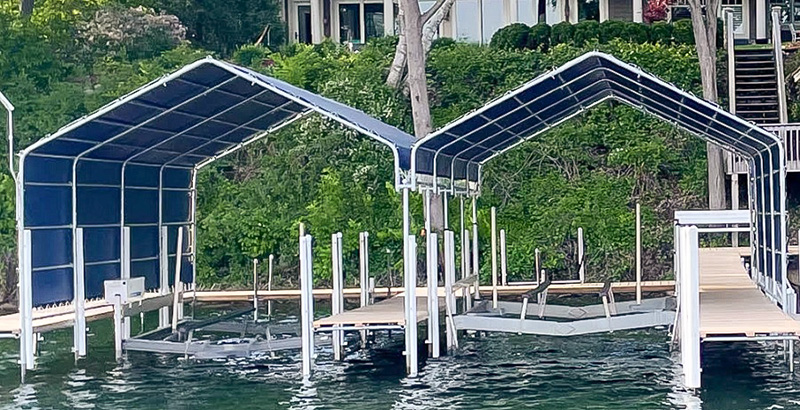 Dual boat lift canopies on aluminum docks in West Central Minnesota.